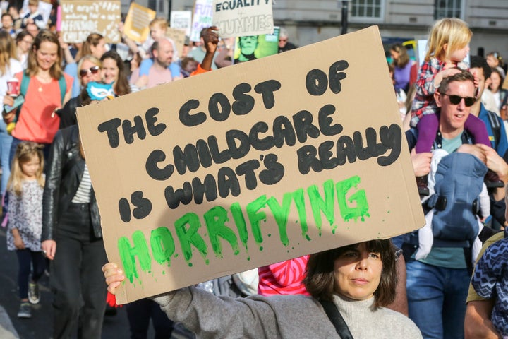 Hundreds of women, parents and young children march through London.