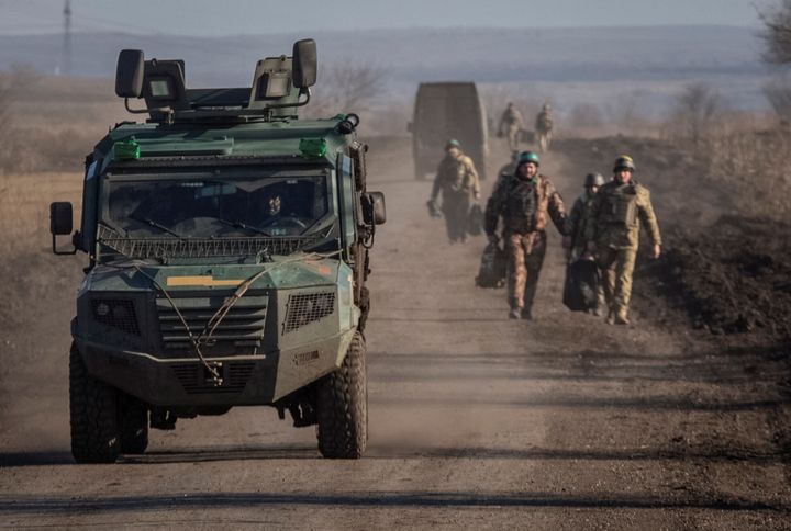 Ukrainian servicemen are seen near the frontline, amid Russia's attack on Ukraine, near Soledar in Donetsk region.