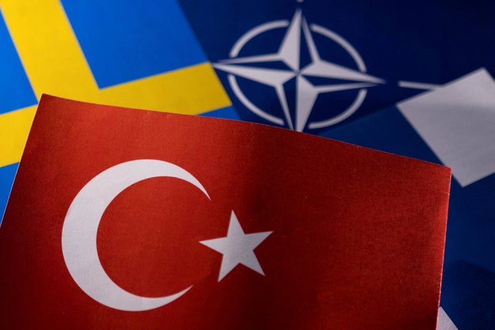  NATO, Turkish, Swedish and Finnish flags are seen in this illustration taken May 18, 2022. REUTERS/Dado Ruvic/Illustration/File Photo