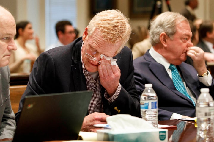 Murdaugh becomes emotional after seeing his family in the courtroom during opening statements Wednesday.