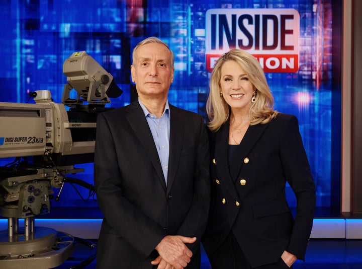 Deborah Norville (right) poses on set with "Inside Edition" executive producer Charles Lachman in 2022.