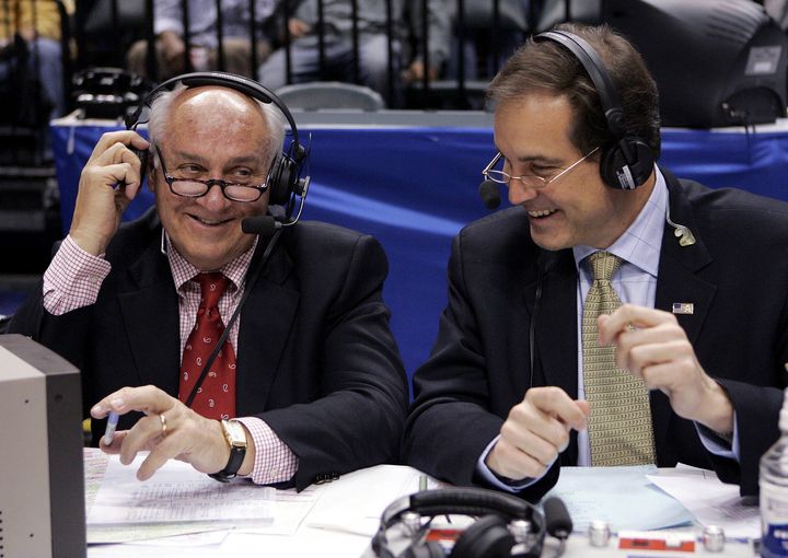 CBS's Billy Packer, left, and Jim Nantz share a laugh during a game in 2006.
