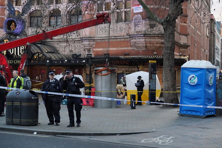 A police tent is erected at Cambridge Circus on the junction between Shaftesbury Avenue and Charing Cross Road in London, after a man died after being crushed by a telescopic urinal.