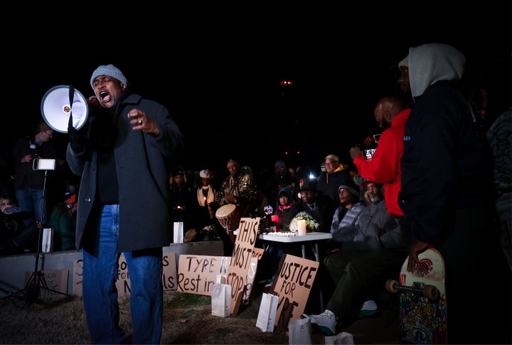 Pastor Andre Johnson speaks at a candlelight vigil for Tyre Nichols. Officials expect further protests after police release footage of the beating. 