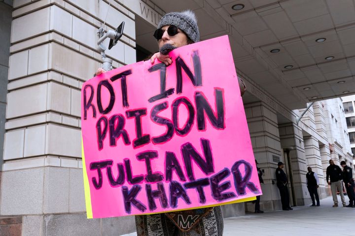 Brianne Chapman protests at the sentencing hearing Friday for Julian Khater and George Tanios at the federal courthouse in Washington. Khater admitted to assaulting Capitol Police Officer Brian Sicknick with chemical spray on Jan. 6, 2021, as officers tried to hold off a mob that had been incited by then-President Donald Trump's claims he lost the 2020 election because of fraud.