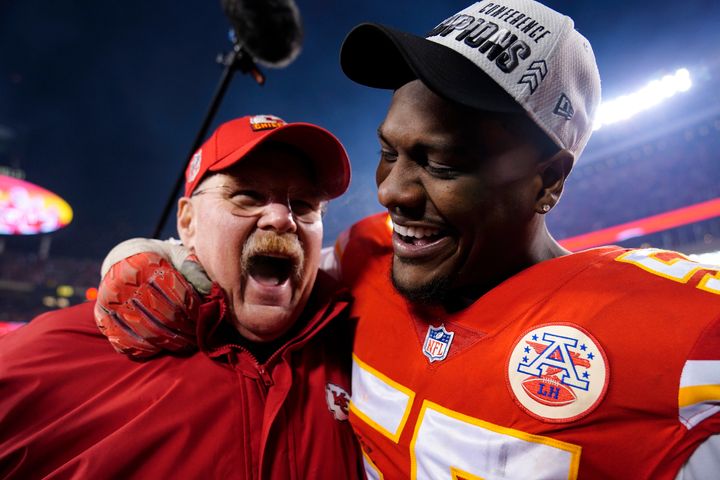 Kansas City Chiefs head coach Andy Reid celebrates with defensive end Frank Clark, right, after the NFL AFC Championship playoff football game against the Cincinnati Bengals on Sunday in Kansas City, Missouri.