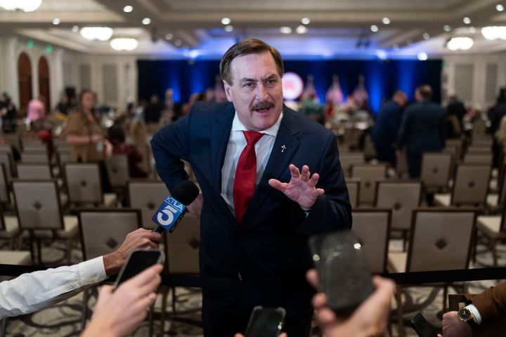 MyPillow CEO Mike Lindell talks to reporters Friday at the Republican National Committee winter meeting in Dana Point, California.