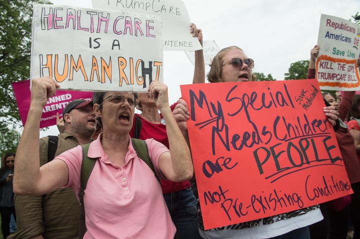 Protesters rally near the U.S. Capitol after House Republicans voted to repeal the Affordable Care Act in 2017. DeSantis was one of those House Republicans. 