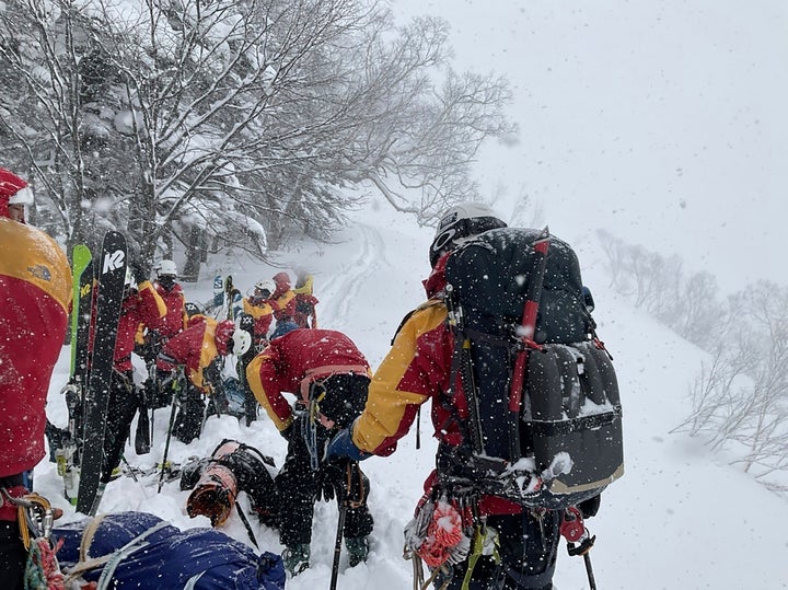 Rescuers in Nagano combing the avalanche site on Monday.