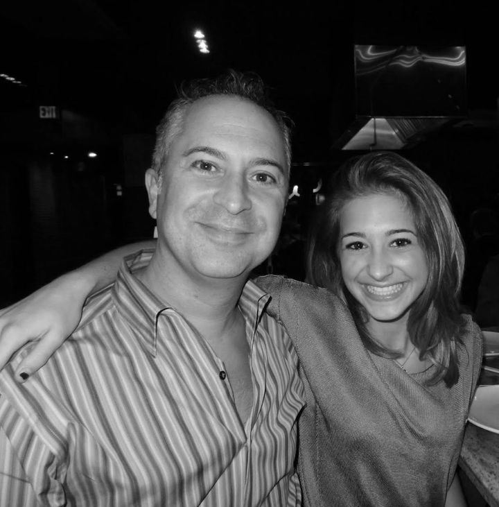 The author with her father at her 17th birthday dinner in 2011, shortly after he came out as gay.