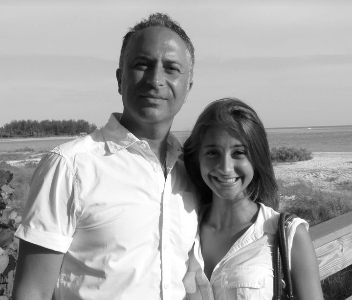 The author and her father on a beach vacation in 2012.