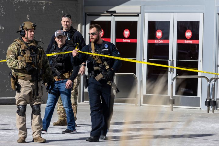 Law enforcement officers are pictured at the scene of a reported shooting at a Target store in Omaha, Neb., on Jan. 31, 2023. Omaha Police Chief Todd R. Schmaderer says city police confronted and shot a man with an assault rifle.