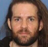 The Grants Pass Police Department provided this undated photo of Benjamin Obadiah Foster, who is accused of torturing a woman he held captive in Oregon.