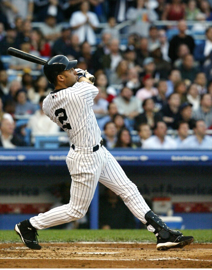 Derek Jeter broke out of his 0-for-32 hitless slump by slamming a lead-off homer.