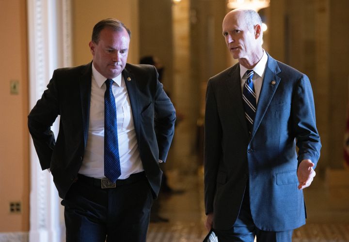 Sens. Mike Lee, left, and Rick Scott, right, got booted off the Commerce Committee by Sen. Mitch McConnell.
