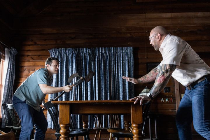 Jonathan Groff, left, tries to defend himself against an unhinged Dave Bautista in "Knock at the Cabin."