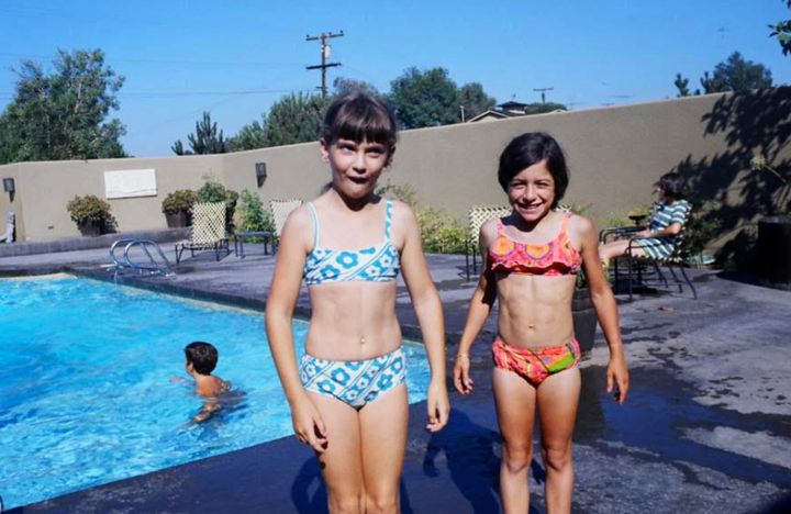 The author (right) at age 12. "I was goofing off at a friend’s pool in San Diego," she writes.