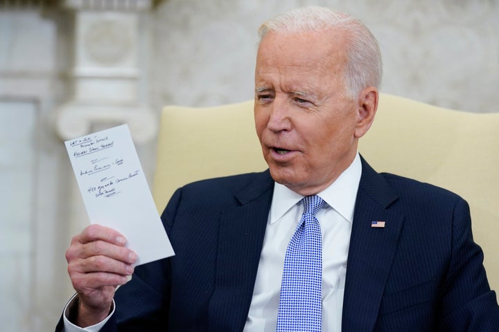 President Joe Biden takes notes during a meeting with Indian Prime Minister Narendra Modi in the Oval Office of the White House, September 24, 2021, in Washington. Biden is a man who writes his thoughts.