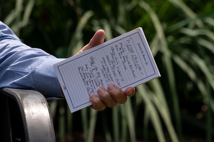 Democratic presidential candidate former Vice President Joe Biden holds a note card as he speaks during a backyard meeting in Lancaster, Pa., on Sept. 7, 2020. 