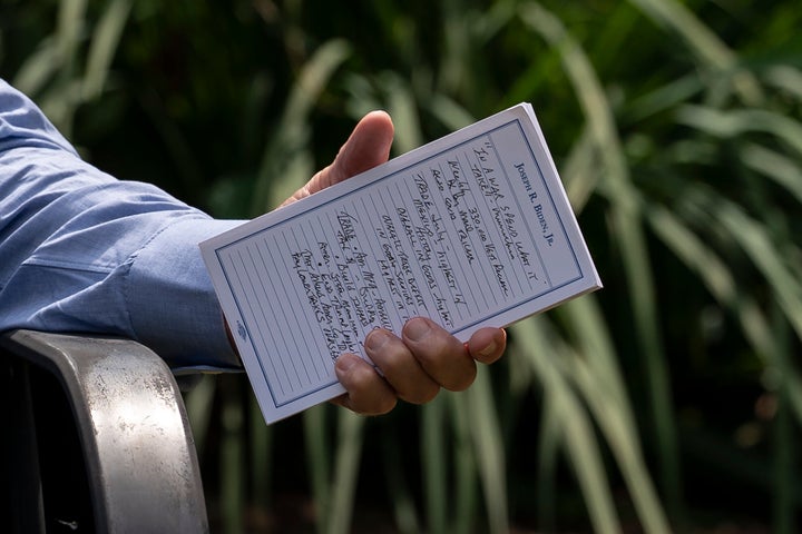 Democratic presidential candidate former Vice President Joe Biden holds a note card as he speaks during a backyard meeting in Lancaster, Pa., on Sept. 7, 2020.