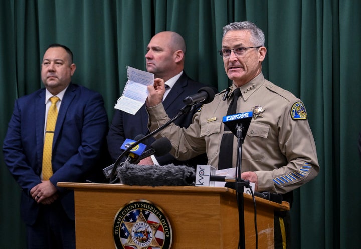 Tulare County Sheriff Mike Boudreaux holds a letter Monday, Jan. 30, 2023, from a Maine woman that sent $100 to add to the reward offered for information about a mass shooting that occurred January 16, in Goshen, Calif. No arrests were announced but autopsies confirmed that all six victims died from gunshot wounds. (Ron Holman/The Times-Delta via AP)