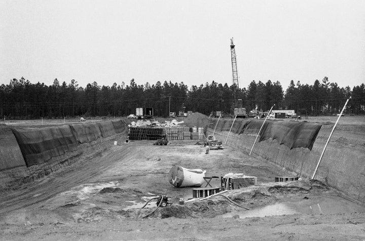 A photo from 1982 shows the 100-foot-wide, 850-foot-long and 22-foot-deep sand and clay orifice in Barnwell, South Carolina, that serves as the burial site for nuclear waste material transported from other areas. 