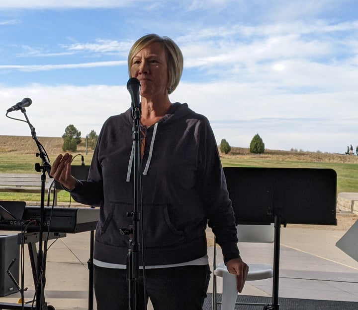 The author speaking at her 50th birthday party/"funeral."