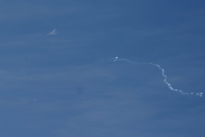 A view of what is believed to be a suspected Chinese spy balloon when it was shot down, seen from Holden Beach, U.S., February 4, 2023. REUTERS/Allison Joyce