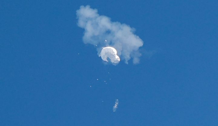 The suspected Chinese spy balloon drifts to the ocean after being shot down off the coast in Surfside Beach, South Carolina, U.S. February 4, 2023. REUTERS/Randall Hill TPX IMAGES OF THE DAY