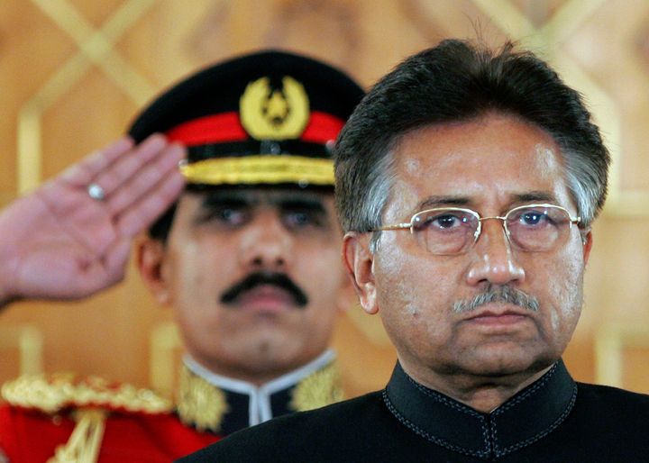 Pakistan's then-President Pervez Musharraf listens to the national anthem before being sworn in as the country's civilian president at President House in Islamabad, Pakistan on Nov. 29, 2007. (AP Photo/B.K.Bangash, File)