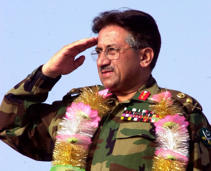 Then-President of Pakistan Gen. Pervez Musharraf salutes on April 9, 2002 at a public rally in Lahore, Pakistan. (AP Photo/Zia Mazhar, File)