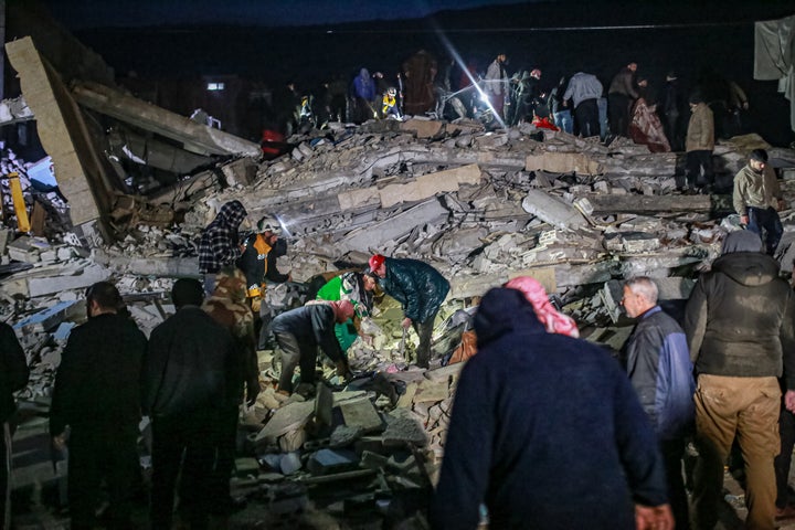 A view of debris of a collapsed building after a powerful earthquake shakes Idlib, Syria, on Feb. 6, 2023.