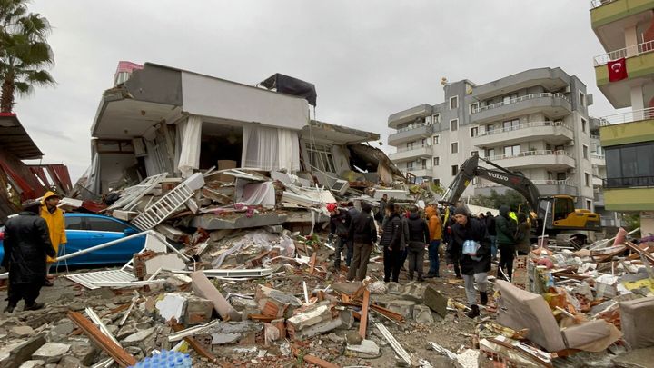 A view of a collapsed building as search and rescue works continue in Hatay, Turkey, after the earthquake hit the southern provinces of the country on Feb. 6, 2023.