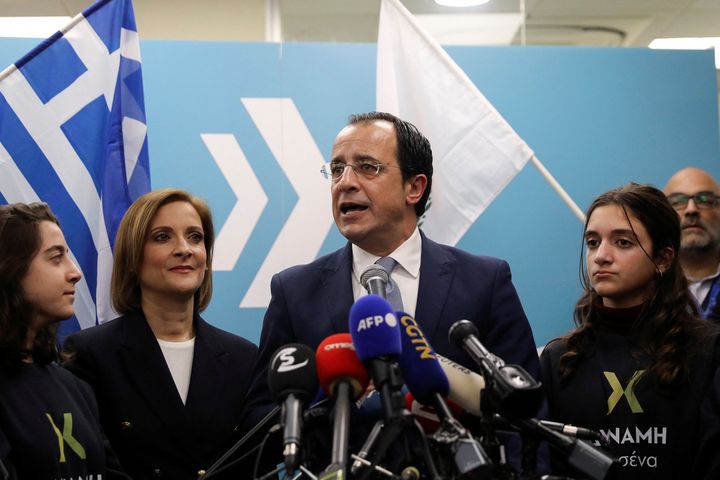 Cypriot presidential candidate Nikos Christodoulides speaks, while next to his wife Philippa Karsera Christodoulides, at his campaign headquarters in Nicosia, Cyprus, February 5, 2023. REUTERS/Yiannis Kourtoglou