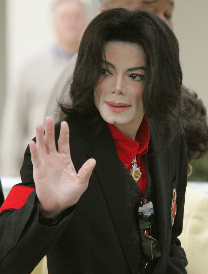 Pop star Michael Jackson waves to fans upon leaving the Santa Barbara Superior County Court.