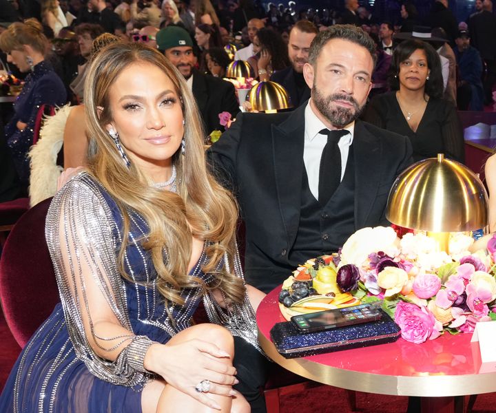 Jennifer Lopez and Ben Affleck had enviably good seats at the 65th Grammy Awards Sunday night, but cameras caught Affleck looking like he'd rather be anywhere else throughout the night.