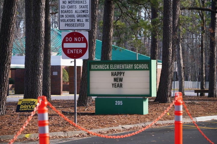 NEWPORT NEWS, VA - JANUARY 07: A school sign wishing students a "Happy New Year" is seen outside Richneck Elementary School on January 7, 2023 in Newport News, Virginia. A 6-year-old student was taken into custody after reportedly shooting a teacher during an altercation in a classroom at Richneck Elementary School on Friday. The teacher, a woman in her 30s, suffered “life-threatening” injuries and remains in critical condition, according to police reports. (Photo by Jay Paul/Getty Images)