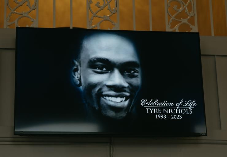 A screen at the entrance of Mississippi Boulevard Christian Church displays the celebration of life for Tyre Nichols on Wednesday in Memphis, Tennessee. On Jan. 7, the 29-year-old driver was violently beaten by Memphis police officers after a traffic stop. Nichols died of his injuries three days later. Five Black officers have been fired and face multiple charges, including murder, in the beating death.