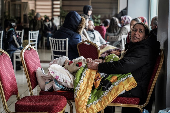 People gather in a shelter in Gaziantep, Turkey, on Feb. 6, 2023.
