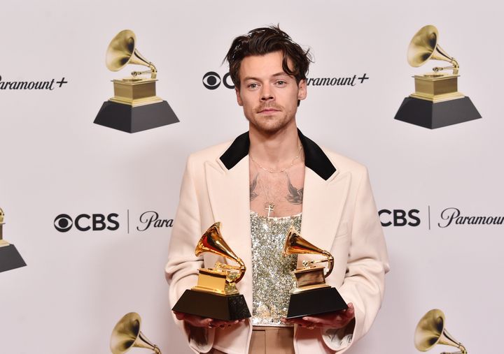 Harry Styles celebrating his two wins at the Grammys on Sunday night