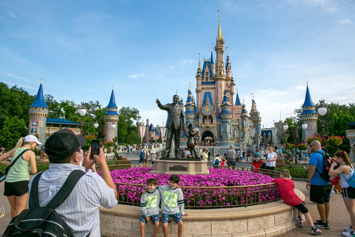People visit Magic Kingdom Park at Walt Disney World Resort in Lake Buena Vista, Florida, on April 18, 2022. 