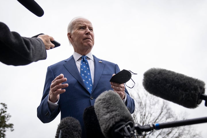 President Joe Biden talks to reporters before walking to Marine One on the South Lawn of the White House on Jan. 4 in Washington, D.C. He is traveling to northern Kentucky to showcase infrastructure investments and his economic plan.