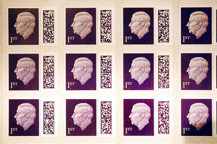 One of the first sheets of the 1st class definitive stamp featuring King Charles III goes on display at the Postal Museum in central London.