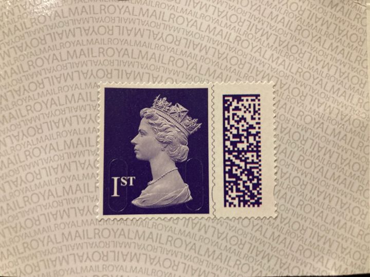 A stamp with the portrait of the Queen