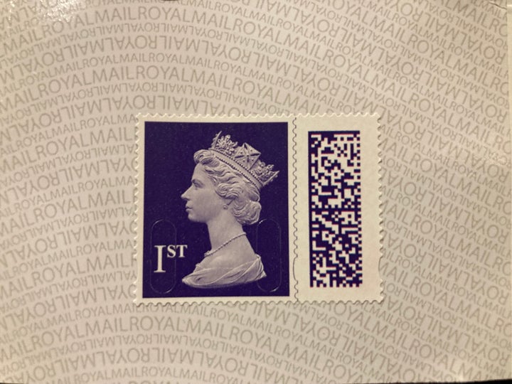 A stamp with the portrait of the Queen