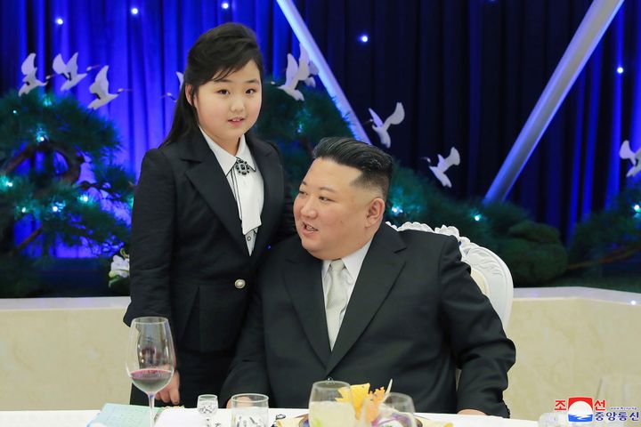 In this photo provided by the North Korean government, North Korean leader Kim Jong Un and his daughter attend a feast to mark the 75th founding anniversary of the Korean People’s Army at an unspecified place in North Korea Tuesday, Feb. 7, 2023. Independent journalists were not given access to cover the event depicted in this image distributed by the North Korean government. 