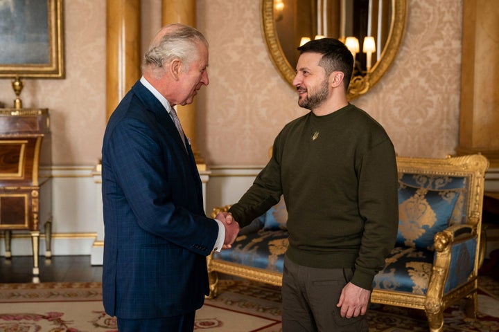 Britain's King Charles III holds an audience with Ukrainian President Volodymyr Zelenskyy, right, at Buckingham Palace, London, on Feb. 8, 2023.