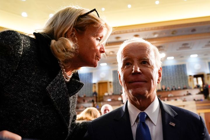 Biden took a moment to grieve and reflect with Rep. Debbie Dingell (D-Mich.) on losing loved ones.