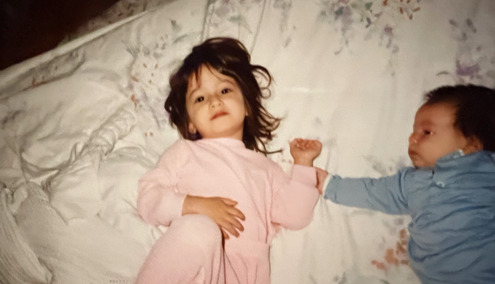 The author at 2, just after her brother was born.