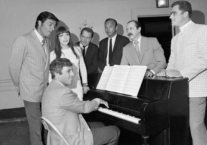 Composer Burt Bacharach is at the piano for the first rehearsal of his first Broadway musical, "Promises, Promises," Sept. 6, 1968. Pitching in with their voice are, from left: actors Jerry Orbach, Jill O'Hara, director Robert Moore, author Neil Simon, producer David Merrick and actor Edward Winter.